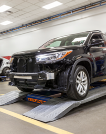Toyota on vehicle lift | Romeo Toyota of Glens Falls in Glens Falls NY