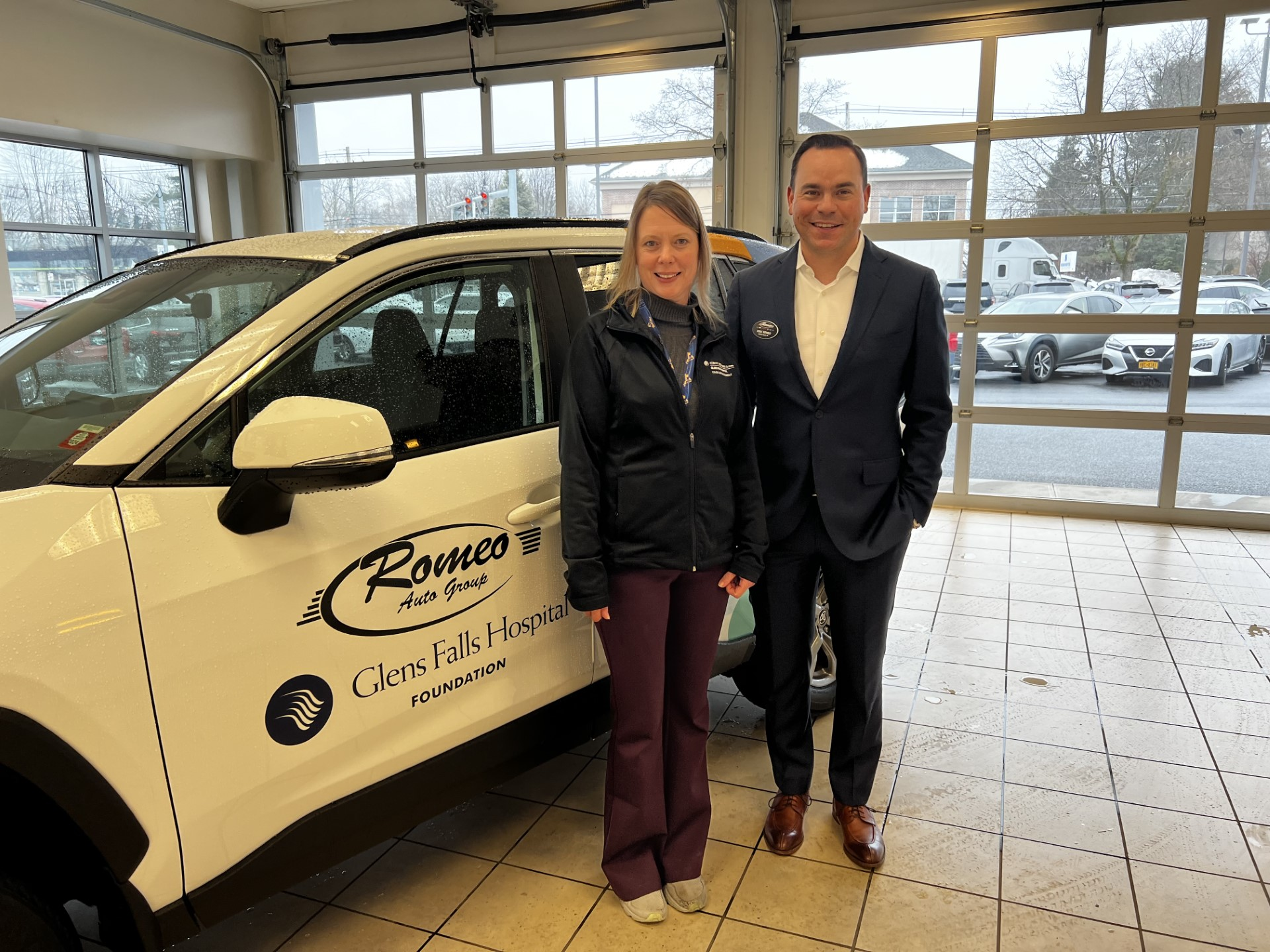 Jennifer H. from Wilton, NY. Pictured with Mike Romeo, owner of Romeo Toyota of Glens Falls.